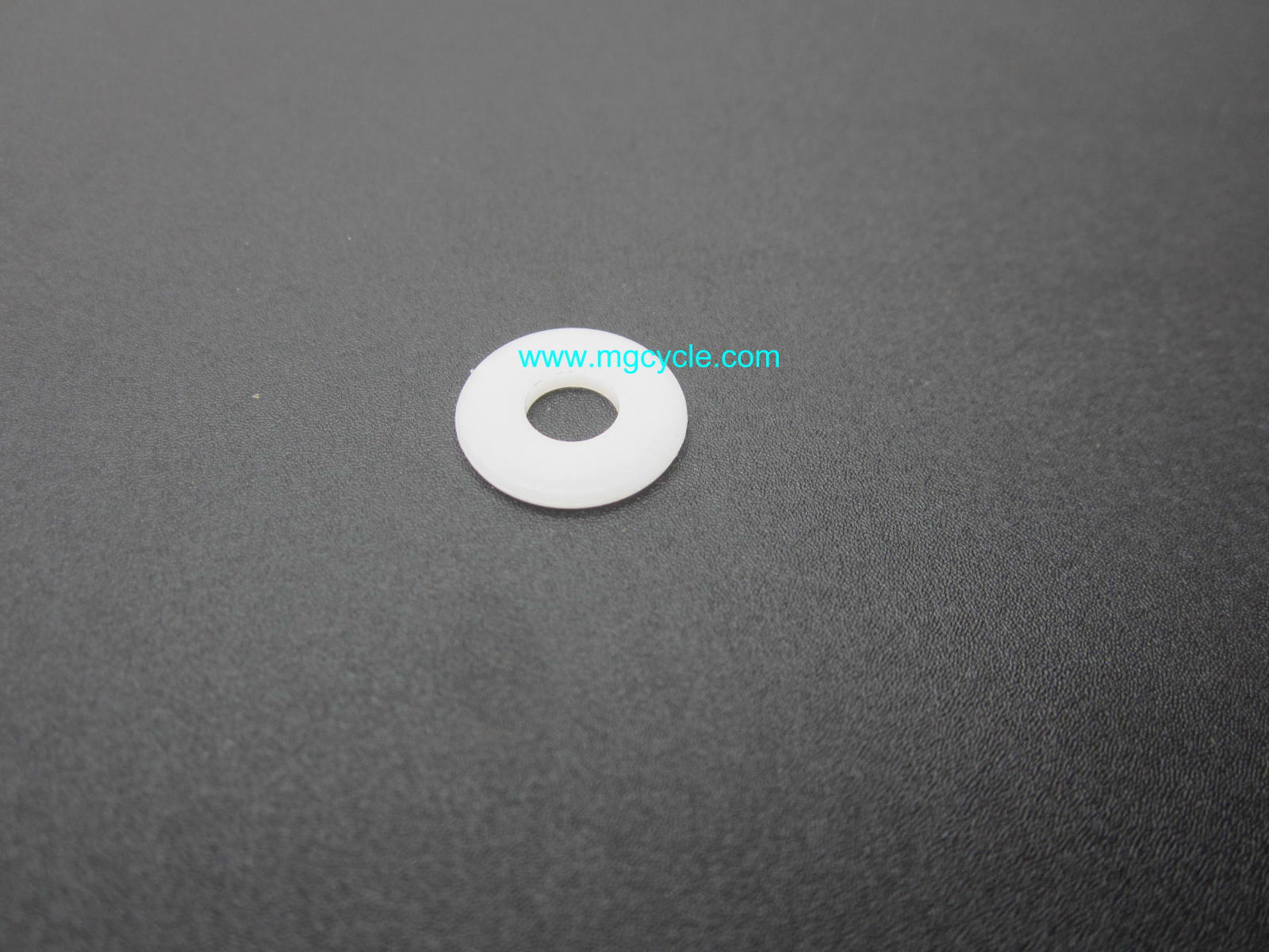 Nylon washer, under body panel and side cover screw heads